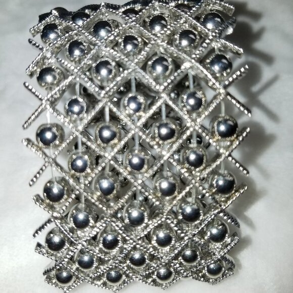 Free with $20 purchase 8" stretchy silver ball bracelet - Picture 3 of 4